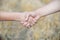 Handshake at the harvest on wheat field background