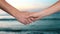 Handshake male and female hands isolated on sea water background close up