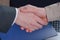 Handshake in the office at the conclusion of the transaction. Business concept. Business proposal