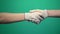 Handshake, shaking hands, handshaking. Two handed gesture. Chromakey. Green Screen