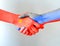 Handshake symbol in the colors of the national flags of China and Russia