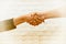 Handshake : Teamwork for success of the business in the future