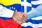 Handshake on Venezuela and Greece flag background