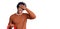 Handsome african american man with afro hair holding supermarket shopping basket stressed and frustrated with hand on head,