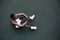 Handsome afro American sportman sitting on the street while taking break after training. Black male having rest after