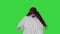 Handsome Arabian Sheikh in sunglasses does some cool dancing on a Green Screen, Chroma Key.