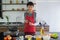 Handsome, Asain young man Smiling happiness to prepare food in the kitchen