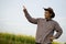 Handsome Asian man farmer is at agriculture land