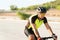 Handsome athlete exercising on a bicycle