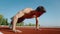 Handsome Athlete Push-Up Street Workout Cross Fitness. Sportsman Training Push Ups Outdoors