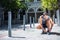 Handsome athlete tying his shoe laces