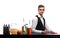 A handsome bartender wipes a bar counter, oranges, bottles of beverages on a white background.