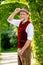 Handsome bavarian man in his 50s standing outdoors in park