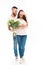 handsome bearded man with bouquet of flowers covering his girlfriends eyes,