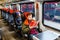 Handsome bearded man, travels in a train and reads a menu