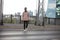 Handsome Black Man Crossing City Street