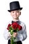 Handsome boy in classic suit with flowers isolated