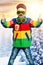 Handsome boy snowboarder in bright ski jacket and glasses.glasses style	color traffic light