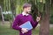 Handsome boy using phone for learning and reading an electronic books, technology