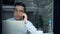 Handsome businessman working with laptop in coffee shop