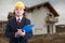 Handsome construction inspector on building site