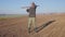 Handsome farm worker with beard with farm tools protrait