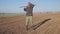 Handsome farm worker with beard with farm tools protrait