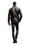 handsome fashion black man walking with his hand in his pocket. leather jacket. jean pants. PNG file