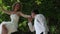 Handsome Groom Kisses Blonde Bride Hand