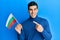 Handsome hispanic man holding bulgarian flag smiling happy pointing with hand and finger