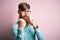 Handsome Irish redhead man with beard wearing glasses over pink isolated background Ready to fight with fist defense gesture,