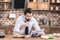 handsome loner businessman drinking coffee and reading newspaper in morning