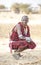 Handsome maasai warrior in his full traditional outfit