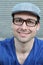 Handsome male with glasses and hat portrait