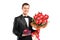 Handsome male holding a bouquet of flowers