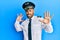 Handsome man with beard wearing airplane pilot uniform afraid and terrified with fear expression stop gesture with hands, shouting