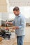 Handsome man cooking in the kitchen