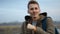 Handsome man dancing outdoor, close-up portrait, morning nature.