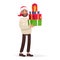 Handsome man dressed in a sweater and a Christmas hat is holding presents. New Year`s sale