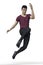 Handsome man in jeans and t shirt leaping into the air