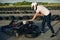 Handsome man in a karting with a car