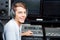 Handsome Man Mixing Audio In Recording Studio