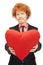 Handsome man with red heart-shaped pillow