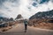 Handsome man running amazing mountains background