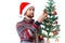 handsome man in a santa hat Christmas decorations holiday New Year studio posing