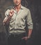 Handsome man in shirt against grunge wall