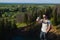 Handsome man shooting selfie in the nature. Hiking trip. Mountaineering moments. Shooting beautiful views of forest