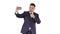 Handsome man in suit taking a selfie while walking on white background.