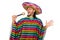 Handsome man in vivid poncho holding maracas