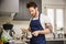 Handsome muscular man in kitchen, cooking